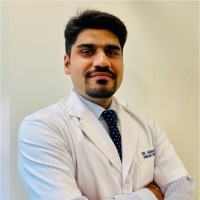 Dr Karn Mehra logo - Similar company to Rapid Heal Force- Rhf