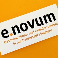 e.novum GmbH logo - Similar company to Edeka Bergmann