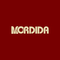 Agência Mordida logo - Similar company to Convertmidia - Marketing Para Restaurantes