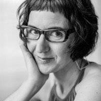 PHOTOPIA, portraits by elizabeth dranitzke logo - Similar company to Photopia Production