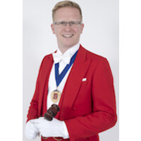 Toastmaster Dan logo - Similar company to Thaelo Wedding Specialist Sicilia