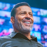 Tony Robbins logo - Similar company to Success Resources Global
