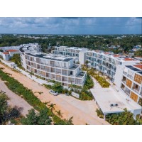 The Waves Tulum Resort logo - Similar company to Bloom Tulum