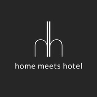 Home Meets Hotel logo - Similar company to Mojo Hotel & Market