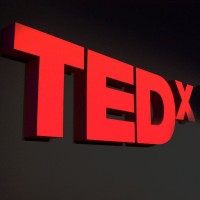 TEDxSayajigunj logo - Similar company to Y9 Entertainment