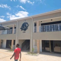 Muzinatu real estate logo - Similar company to Palmridge Properties