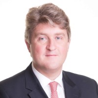 Michael McNamara TD logo - Similar company to Enactus Ul