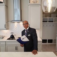Real Deal Neal Real Estate logo - Similar company to Re/Max Real Estate Groups