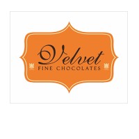 velvet fine chocolates logo - Similar company to Handique Mercantile