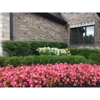 Hartman Landscape logo - Similar company to Trinity Stone & Landscape Supply