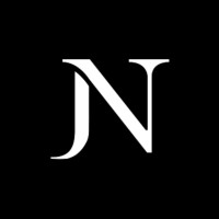 Just Needles logo - Similar company to Frontier Trade Link