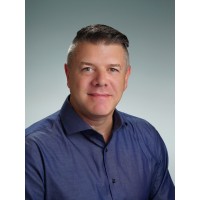 Greg McManus Realtor logo - Similar company to Maggy Realty