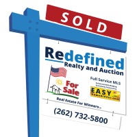 Redefined Realty and Auction logo - Similar company to Tasp International