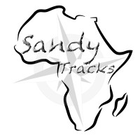 Sandy Tracks logo - Similar company to Queer Ink
