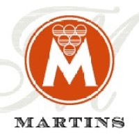 Burgunder Himmel Martins logo - Similar company to Vulcan Hungary