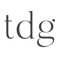 The Design Group logo - Similar company to By Design Structural Engineers