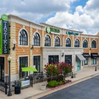 Spring Creek Village - Edmond, OK logo - Similar company to America'S Swimming Pool Company - Edmond, Ok