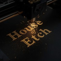 House of Etch logo - Similar company to Nyle Dehydrators