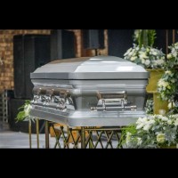Casket World logo - Similar company to Covington Casket Co