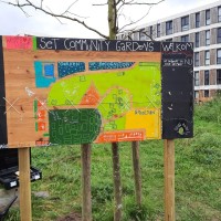 SET ‐ Community Gardens and Center logo - Similar company to Imp-Act Agency