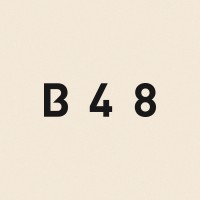 Base 48 logo - Similar company to Komi