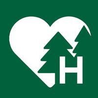 Heartwood Resort logo - Similar company to Visit Bastrop
