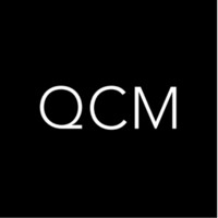 QCM logo - Similar company to Dynamic Dog