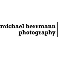 Michael Herrmann Photography logo - Similar company to Herrmann Group Ag