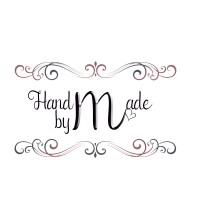 Handmade by M logo - Similar company to Wolf Sport