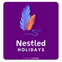 Nestled Holidays logo - Similar company to Travjunkline Holidays