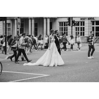 Richard Thompson Exclusive Alterations logo - Similar company to Angelica Bridal