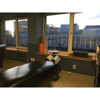 Seaport Spine logo - Similar company to Wake Emergency Physicians, Pa