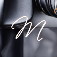 MarketCom logo - Similar company to Iopay