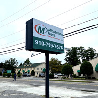 Minuteman Press Wilmington, NC logo - Similar company to New Hanover Printing