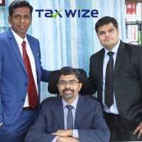 TAXWIZE logo - Similar company to Sl & Associates
