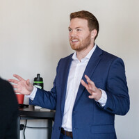 Nathan Minns International: Interactive Keynote Speaker, Workshop Facilitator, & Conference Emcee logo - Similar company to A. E. Consulting Solutions
