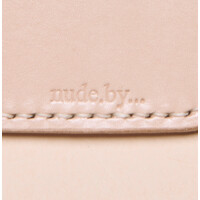 nude.by... logo - Similar company to Il Bikini