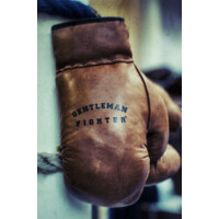 GENTLEMAN FIGHTER logo - Similar company to Crystal