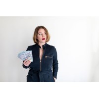 Her First $100K logo - Similar company to Cat Johnson Co