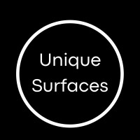 Unique Surfaces logo - Similar company to Ion Electrical Distributor