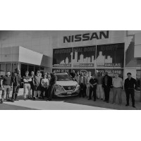Metro Nissan Dallas logo - Similar company to Dax - Dealers Auction Xchange