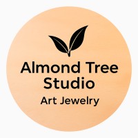 Almond Tree Studio logo - Similar company to Community Development Advocacy Foundation- Codaf