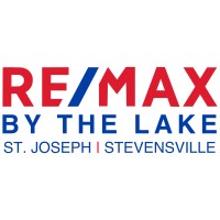 RE/MAX by the Lake logo - Similar company to Century 21 Lois Lauer Realty