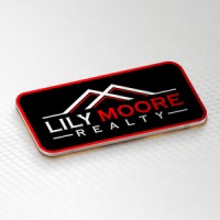 Lily Moore Realty logo - Similar company to Tacky Box