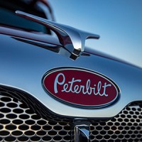 Peterbilt Motors Company logo - Similar company to Rush Enterprises, Inc
