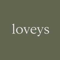 Loveys logo - Similar company to Beaming