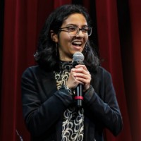 Ritu Does Comedy logo - Similar company to Stanford Debate Society