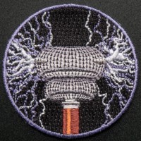 Tesla Coin logo - Similar company to Tesla Electronics Ltd