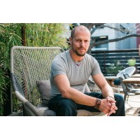 Tim Ferriss logo - Similar company to Sales Artillery