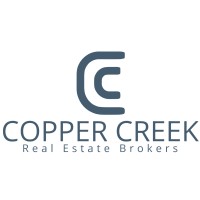 Copper Creek Real Estate logo - Similar company to The Goodrich Team | Compass